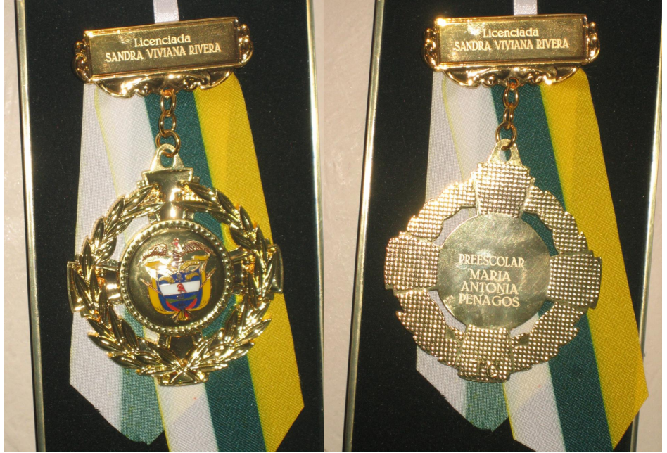 Medalla Stelia Quintero sandra Rivera Tangarife